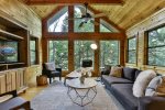 Living room with forest backdrop
